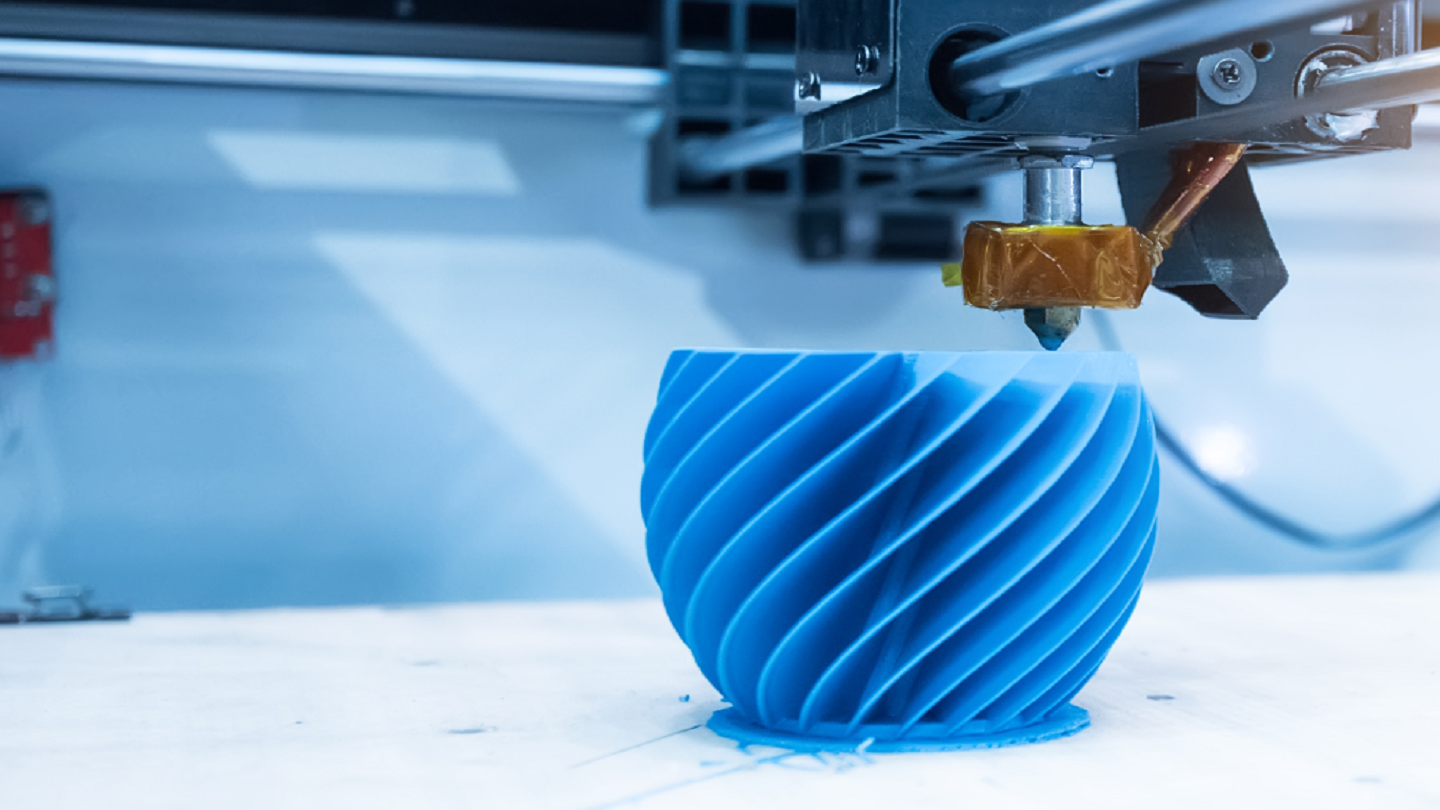 picture of a machine 3D printing an object