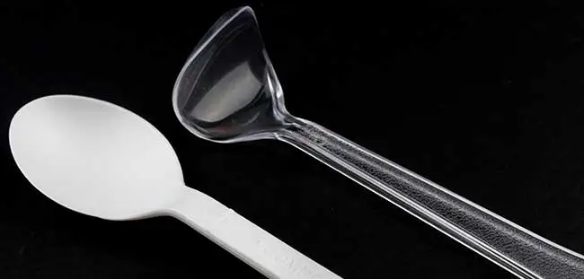a plastic spoon and plastic spoon