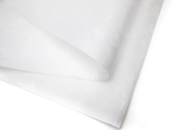 a close up of a white folded paper