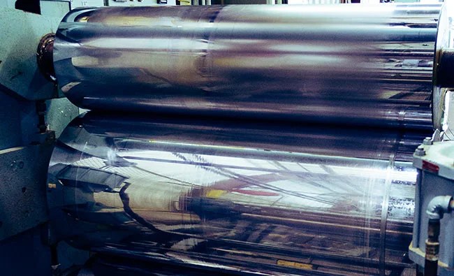 a roll of metal in a factory