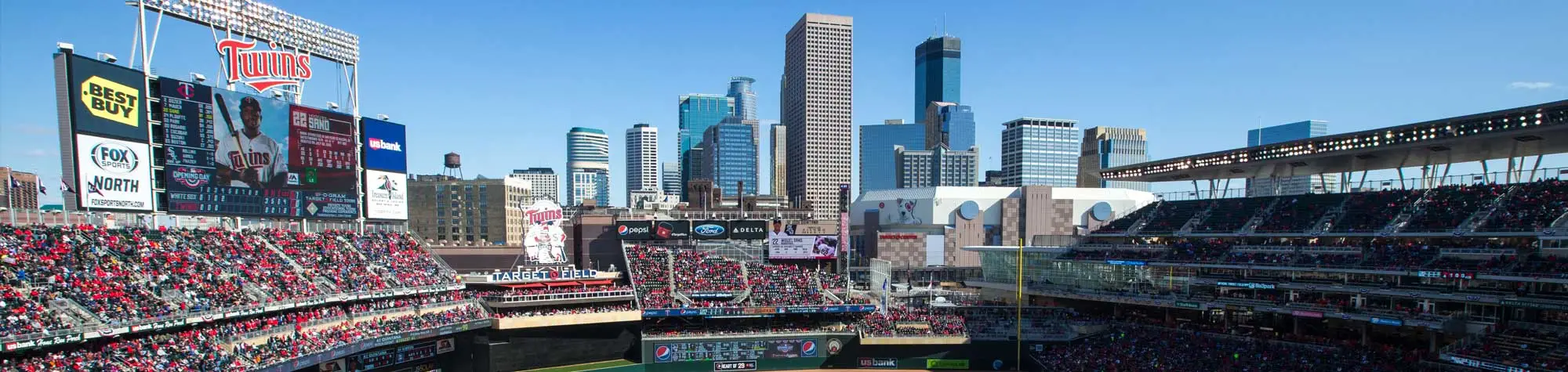 a stadium with a crowd of people in the stands