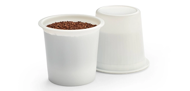 a white container with brown food in it
