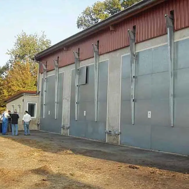 a group of people standing outside of a building