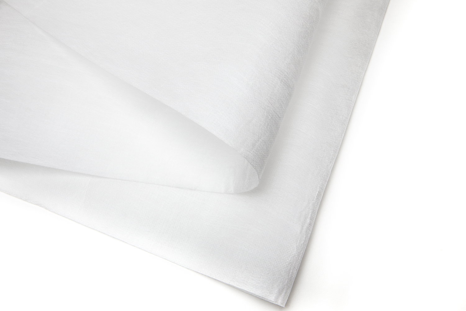 a close up of a white folded fabric