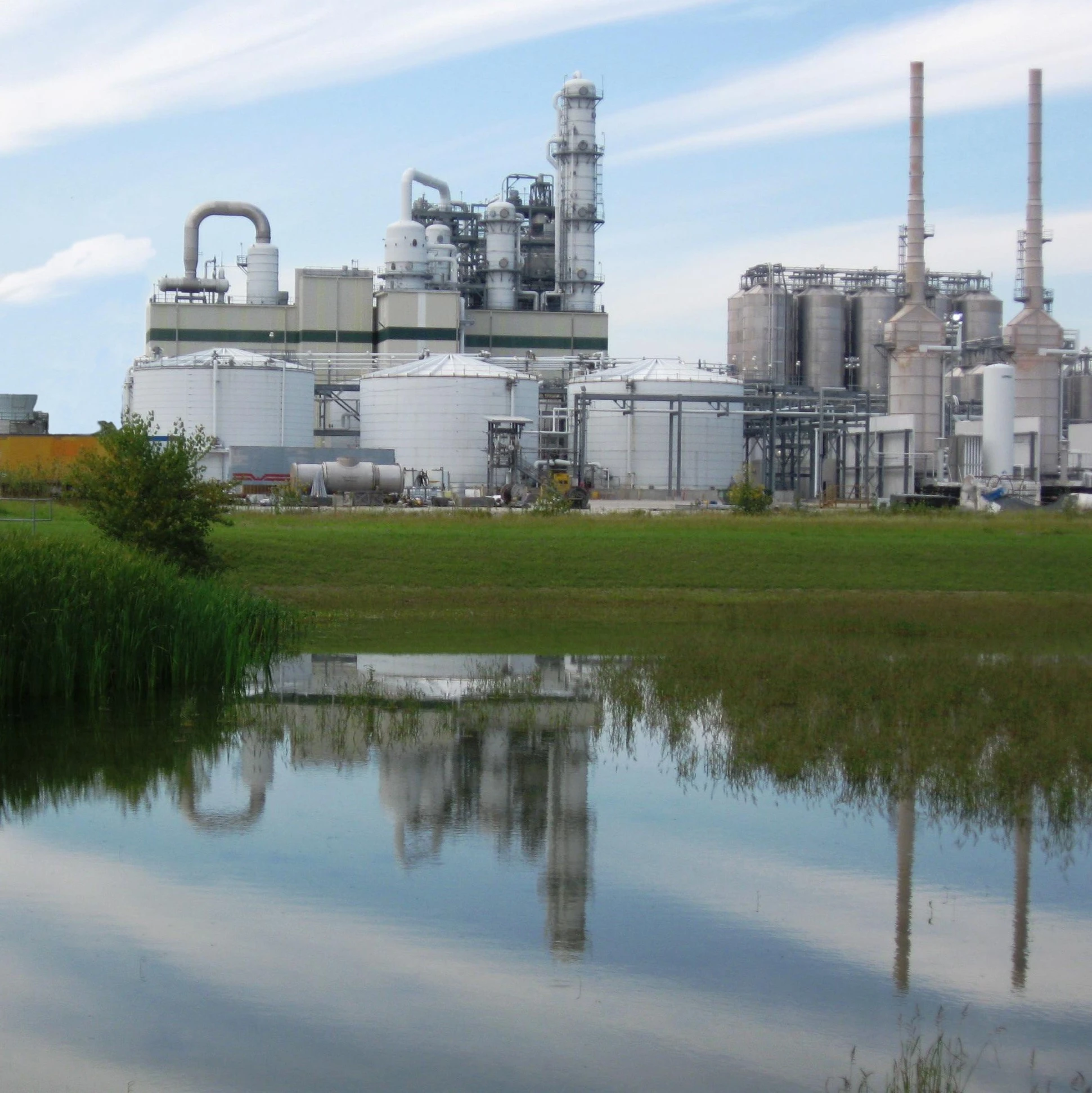 a factory with a body of water