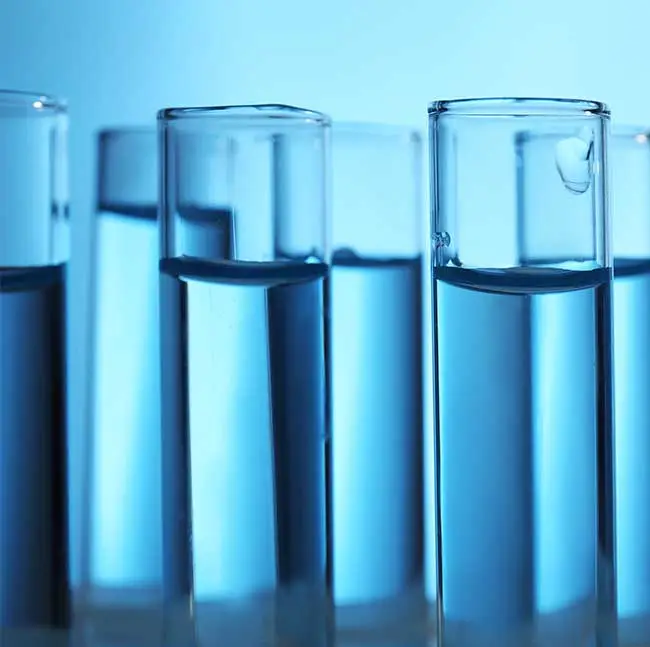 a group of test tubes with liquid in them