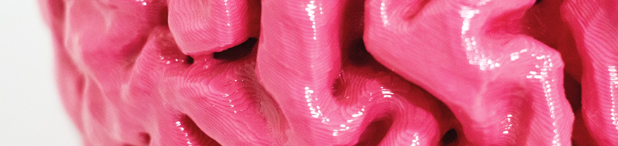 a close up of a pink object