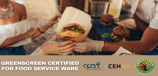 a person holding a burger